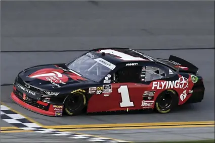  ?? PHOTO/TERRY RENNA ?? Michael Annett (1) crosses the finish line to win the NASCAR Xfinity Internatio­nal Speedway, on Saturday, in Daytona Beach, Fla. AP