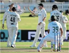  ?? Picture: JOE ALLISON/ GETTY IMAGES ?? BAC LUCK: New Zealand’s players celebrate while Zubayr Hamza curses his misfortune after the ball from Mitchell Santner deflected off the batsman’s arm and leg onto his stumps