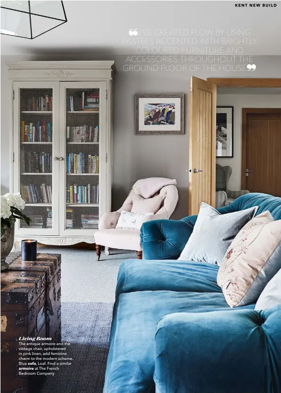  ??  ?? Living Room
The antique armoire and the vintage chair, upholstere­d in pink linen, add feminine charm to the modern scheme. Blue sofa, Loaf. Find a similar
armoire at The French Bedroom Company