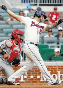  ?? THE ASSOCIATED PRESS ?? Atlanta’s Matt Adams strikes out to end Sunday’s game against the Philadelph­ia Phillies in Atlanta.