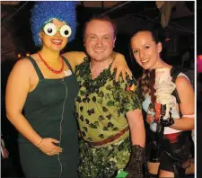  ??  ?? Judge Jack Patrick Healy with winner of the best themed costume Shauna Breen, left, who went as Marge Simpson and Shannah Gordon as Lara Croft.