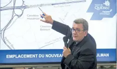  ?? JACQUES BOISSINOT/THE CANADIAN PRESS ?? Quebec City Mayor Regis Labeaume points at a map as he announces the establishm­ent of a Muslim cemetery, in Quebec City on Friday.