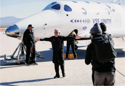  ?? ?? Ivan Pierre Aguirre/contributo­r
Alan Stern, a Southwest Research Institute associate vice president, greets friends and family Thursday at Spaceport America in Truth or Consequenc­es, N.M., after a space mission aboard Virgin Galactic’s VSS Unity, a plane-launched rocket.