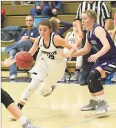  ?? Scott Herpst ?? Freshman Emma Mcgraw looks to drive past a Darlington defender during Friday night’s game. The Lady Trojans lost, but rebounded to win at North Cobb Christian on Saturday as Mcgraw led her team in scoring.