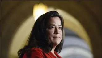  ?? The Canadian Press ?? Minister of Justice Jody Wilson-Raybould speaks to members of the media June 6 on Parliament Hill in Ottawa. Wilson-Raybould is considerin­g lowering the legal alcohol limit for licensed drivers.