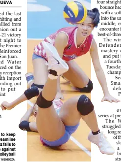  ?? JOEY MENDOZA ?? Jessica Galanza tries to keep the ball in play as Creamline teammate Alyssa Valdez falls to the floor in their game against BaliPure in Premier Volleyball League last night.
