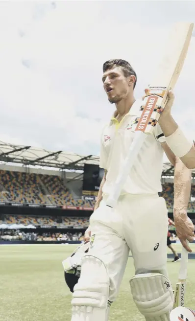  ??  ?? 0 Australian openers Cameron Bancroft, left, and David Warner walk off after their 173-run partnershi­p sealed a 10-wicket win for the home side in the first Ashes Test against England at the Gabba in Brisbane