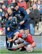  ??  ?? Jonathan Davies scores for Wales in their scratchy win over Scotland.