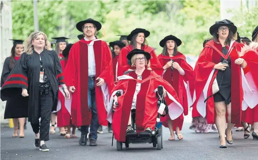  ?? BERNARD WEIL/TORONTO STAR ?? Convocatio­n for York University’s class of 2018 began yesterday with graduates celebratin­g their achievemen­ts despite a strike of nearly four months.