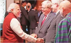  ??  ?? NEW DELHI: Indian Prime Minister Narendra Modi (left) interacts with former prime minister of Australia Kevin Rudd, third right, former prime minister of Canada Stephen Harper (second right) and former president of Afghanista­n Hamid Karzai at the...