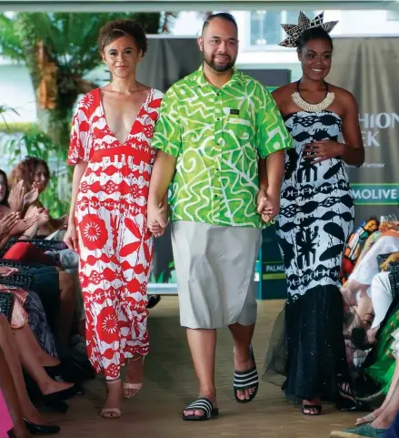  ?? ?? Shane Samuel Laboriel Pickering accompanie­d by models wearing his designs during a fashion show.