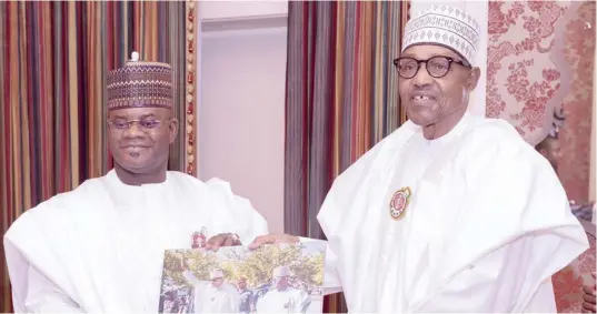  ?? ?? President Muhammadu Buhari (right) receives the Governor of Kogi State, Alhaji Yahaya Bello, on a thank you visit at the State House on January 13, 2023.