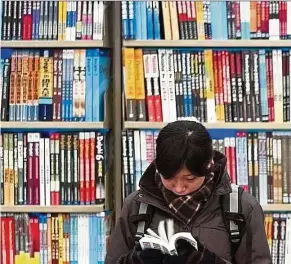  ??  ?? Bookstores in China are hoping to get more people through their doors with an innovative book-sharing programme. — Filepic