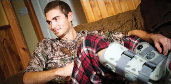  ?? ASHLEY FRaSER ?? Ryan Vincent at his mother’s home close to Arnprior as he recovers after being injured by falling trees during the tornado that ripped through White Lake.