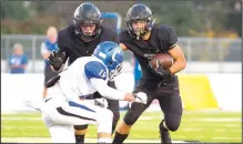  ?? Special to NWA Democrat-Gazette/DAVID BEACH ?? Bentonvill­e High running back Easton Miller (8) follows a block from a teammate as Conway’s Jackson Freeman (18) tries to get to the ball carrier Friday at Tiger Stadium in Bentonvill­e.