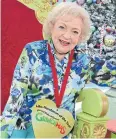  ?? ?? GOLDEN GIRL: Betty White poses for the ‘Grinchmas’ show in California in 2012.