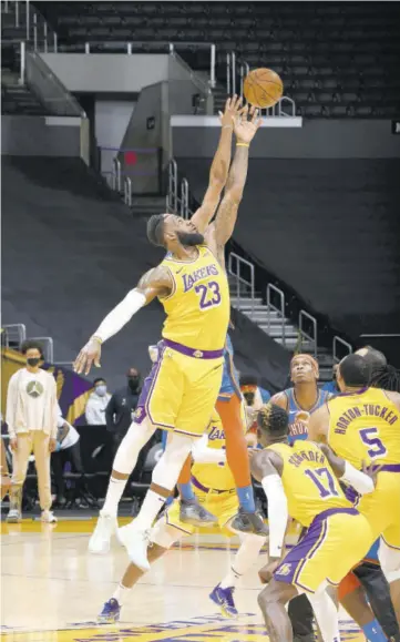  ?? (Photo: AFP) ?? Lebron James of the Los Angeles Lakers jumps for the ball during the game against the Oklahoma City Thunder at STAPLES Center in Los Angeles, California, on Monday.