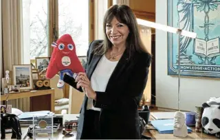  ?? Reuters/Benoit Tessier ?? Mascot: Mayor of Paris Anne Hidalgo poses with the official toy mascot, the Phryges, of the Paris 2024 Olympic and Paralympic Games in an interview with Reuters at the Paris City Hall on Wednesday. /