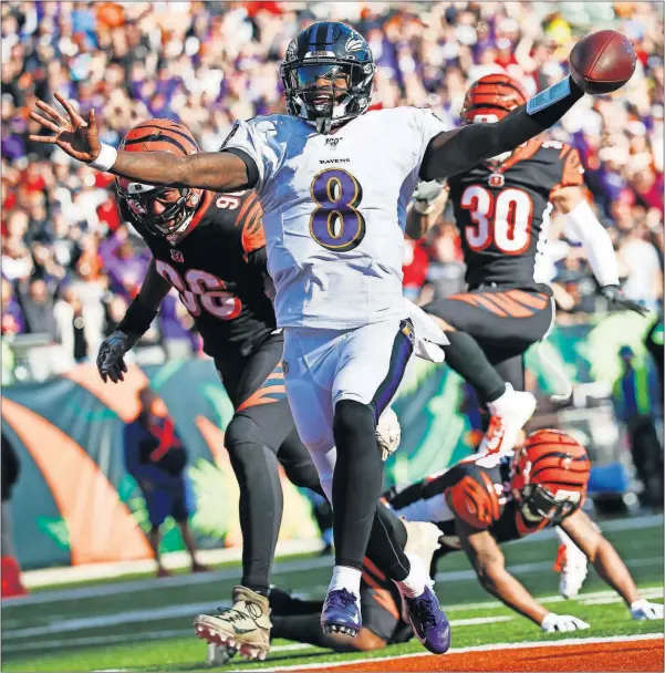  ?? [FRANK VICTORES/THE ASSOCIATED PRESS] ?? Ravens quarterbac­k Lamar Jackson celebrates his touchdown during last Sunday’s game against the Bengals in Cincinnati.