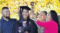  ?? PHOTO: PETER MCINTOSH ?? Celebratio­n time . . . Samoan University of Otago graduand Eliana Viali, with her brother Zenith Viali, father Dr Satupaitea Viali, a Samoanbase­d cardiologi­st, and mother Sialei Viali.