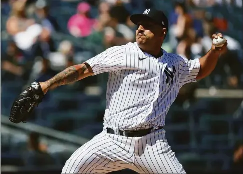  ?? Dustin Satloff / Getty Images ?? The Yankees’ Nestor Cortes pitches during the fifth inning against the Rangers at Yankee Stadium on Monday.