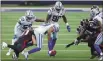  ?? TOM PENNINGTON — GETTY IMAGES ?? C.J. Goodwin (No. 29) of the Dallas Cowboys recovers an onside kick against the Atlanta Falcons in the fourth quarter at AT&T Stadium on Sunday in Arlington, Texas.