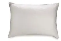  ?? Contribute­d by bed bAth And beyond ?? Designed for back and stomach sleepers, the Isotonic Indulgence Back/Stomach Sleeper pillow ($29.99) has a removable cotton cover.