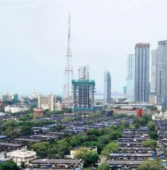  ?? ?? AT CHAWLA WORLI area in Mumbai. Land accounts for 69.2 per cent of the value of assets held by households in rural India and 49.4 per cent in urban India, while buildings account for 22.3 per cent and 37.5 per cent, respective­ly.