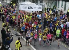  ??  ?? They’re off! Organisers are expecting another bumper crowd at this year’s Tubbercurr­y St Patrick’s Day Road Race.