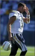  ?? TERRILL ?? Los Angeles Chargers quarterbac­k Philip Rivers walks to the sidelines during the second half of an NFL football game against the Kansas City Chiefs, Sunday, in Carson. AP PHOTO/MARK J