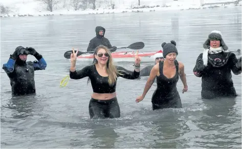  ?? PHOTOS BY JOHN LAW/NIAGARA FALLS REVIEW ?? Extreme cold or not, the seventh annual Chippawa Polar Bear Dip went on as scheduled Saturday.
