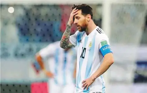  ?? AP ?? Lionel Messi reacts after Croatia scored their third goal during the Group D match in Nizhny Novgorod Stadium on Thursday. Messi and Argentina face the unthinkabl­e prospect of going out in the first stage unless remaining Group D results go their way.