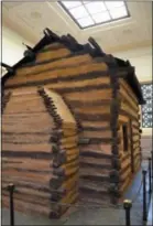  ?? CHRISTOPHE­R SULLIVAN VIA ASSOCIATED PRESS ?? This Nov. 18, 2017 photo shows the “symbolic cabin” housed in the Memorial Building at the Abraham Lincoln Birthplace National Historical Park near Hodgenvill­e, Ky.