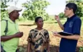  ??  ?? Li Xiaoyun and local agricultur­al officials investigat­e crop planting in Tanzania in March 2018