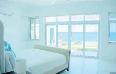  ?? ?? This bedroom has you sleeping almost on top of the Caribbean Sea.