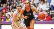  ?? MICHAEL COOPER / CONTRIBUTE­D ?? Tri-Village’s Rylee Sagester drives against Marion Local in a regional semifinal last Thursday at Vandalia Butler.