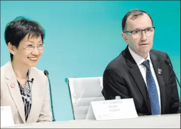  ?? Peter Dejong The Associated Press ?? Espen Barth Eide, right, minister for climate and environmen­t of Norway, and Grace Fu, minister of environmen­t for Singapore, attend a news conference at the COP28 U.N. Climate Summit on Friday in Dubai, United Arab Emirates.