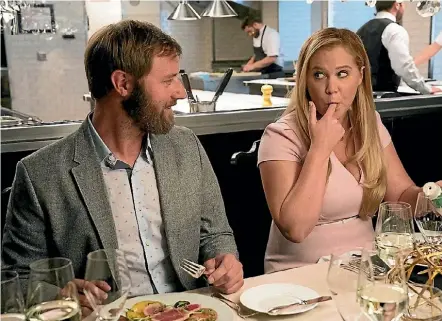  ??  ?? Despite a somewhat thin premise, I Feel Pretty does allow Amy Schumer to show the full range of her prowess for physical comedy and comedic timing.