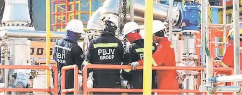 ??  ?? PBJV employees are seen inspecting an offshore oil rig. PBJV has recently signed a MoC with a Norwegian subsea service provider, OI to work together in Malaysia to provide deepwater installati­on of subsea umbilicals, risers and flowlines and related...