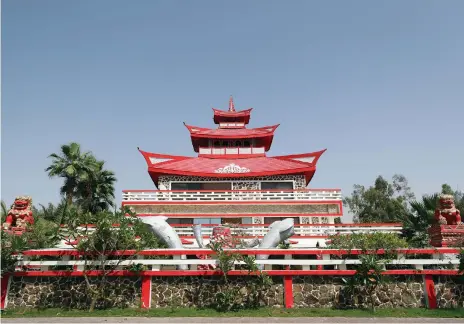  ?? Chris Whiteoak / The National ?? Zakaria Doleh planned a bungalow when he bought a plot in Al Bada’a, but his pagoda became a landmark