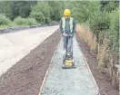  ?? ?? Flattening the towpath.