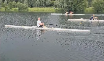  ??  ?? Barry McCann during his epic row at Peterborou­gh City Rowing Lake