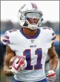  ?? TIM BRADBURY / GETTY IMAGES 2017 ?? Zay Jones (11) of the Buffalo Bills warms up in December before a Patriots game.