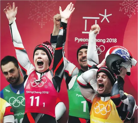  ?? DAN ISTITENE/GETTY IMAGES ?? Four years of team-relay luge frustratio­n came to an end at Olympic Sliding Centre in Pyeongchan­g, South Korea, Thursday as Team Canada Gough, second from left, Sam Edney, Justin Snith and Tristan Walker (not pictured) — captured a silver medal. Alex