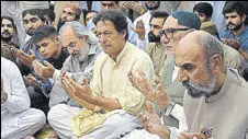  ?? AFP ?? The military, judiciary and bureaucrac­y seem to be behind Khan.