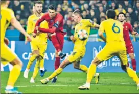  ??  ?? Cristiano Ronaldo scored the 700th goal of his career in Kiev on Monday.
AFP