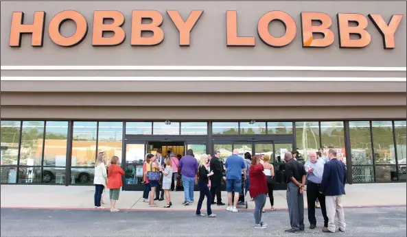  ?? File photo ?? Craft store: Customers gather around Hobby Lobby on its opening day at the Mellor Park Shopping Mall.