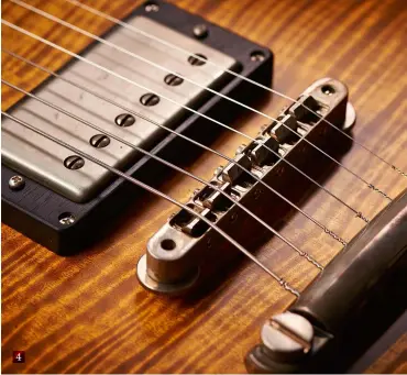  ??  ?? 4 Pickups are hand scatter-wound by Marc Ransley at Mojo; hardware includes ABR-1 style bridge and bell brass tailpiece by the German ABM company