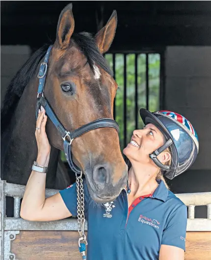  ??  ?? Saddling up: Charlotte Dujardin with her original Olympic horse, Mount St John Freestyle, who was not fit to travel. She will now ride Gio