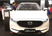  ?? FRIZAL/JAWA POS ?? CREAM OF A CREAM: Mazda CX-5 yang bersaing dengan BMW X-1 dan Mercy GLA di segmen luxury crossover.